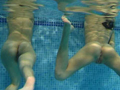 Sensual lesbian girlfriends making love under the water