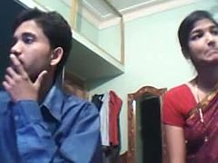 Indian woman shows her tits for the webcam and sucks her man's dick