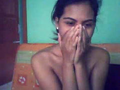 Indian cutie poses on webcam completely naked