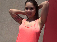 Shameless girl giving head outdoor in a public place