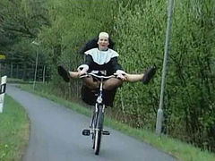 Nun On Bike