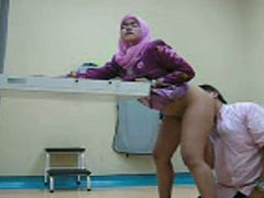 Happy office man rims his Malay wife and fucks her on the table